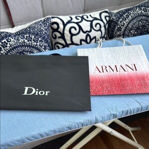 Giorgio Armani and Dior paper bags red and White and black